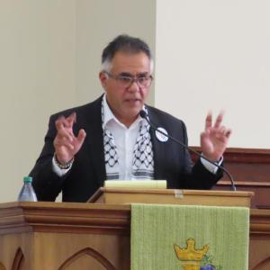 Faisal Khan addressing the PPP meeting in the Second Congregational Church. Courtesy photo﻿