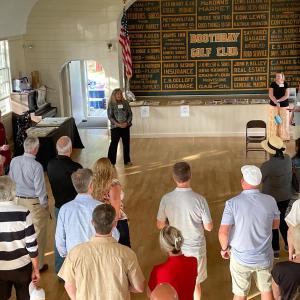 Boothbay Register's Sarah Morley speaks to the Business After Hours crowd at the Boothbay Railway Village Museum Aug. 6. FRITZ FREUDENBERGER/Boothbay Register