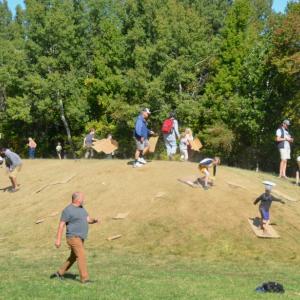 Sliding on cardboard at the fair. (Photo by Lynda Clancy)