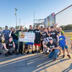 Logan Melcher and team join together in Victory Lane following his Boss Hogg 150 victory. Jasen Dickey photo 