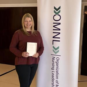 Rachel Dodge, RN, CMSRN, with her OMNL Nurse Leader Award. Courtesy photo