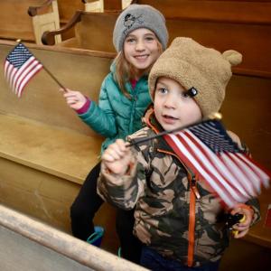 Eloise and her brother Eivin Pease of Brunswick were the youngest attendees at Woolwich's annual Veterans' Day Program. PHIL DI VECE/Wiscasset Newspaper.