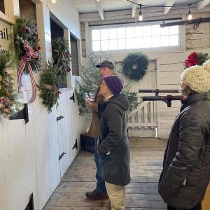 Shoppers in the Holiday Gift Shop, in the Nickels-Sortwell House barn, on Federal St., before casting a ballot for their People’s Choice. Lucia Droby photo