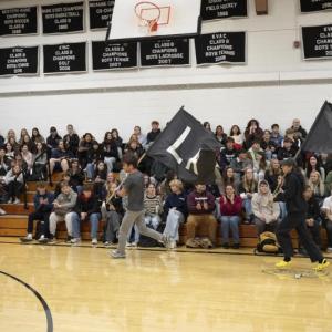 Lincoln Academy athletes celebrate the start of the fall sport season with the running of the Spirit Flags. Courtesy of Hilary Petersen