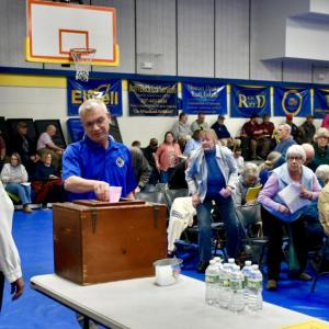 EMS Director Danny Evarts places his ballot in the ballot box. PHIL DI VECE/Wiscasset Newspaper 