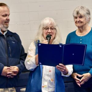 Mary King, (far right) a Woolwich ballot clerk for 50 years was the recipient of the town’s “Spirit of America” award. Also pictured are Selectman Jason Shaw and Allison Helper. PHIL DI VECE/Wiscasset Newspaper