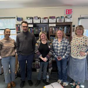 Stacey Adams, far left, and Angela Lathem-Ballard, far right, welcome visiting teachers into their writing and reading classrooms at CTL. Courtesy photo