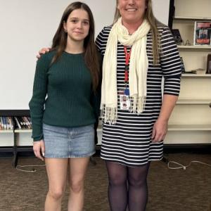 Principal’s Award winner Olivia Marshall, left, and Wiscasset Middle High School Principal Sarah Hubert after Hubert honored Marshall in the April 8 school committee meeting. Kim Andersson photo 
