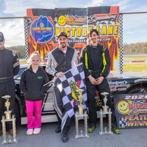 Late Model Victory Lane, from left: Jonathon Emerson, Abby Colson, Frank Moulton and Tiger Colby. Jasen Dickey Photography