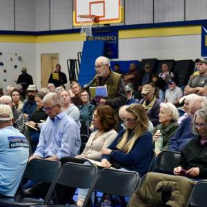 Tom Stoner addresses the library article at the annual town meeting. PHIL DI VECE/Wiscasset Newspaper