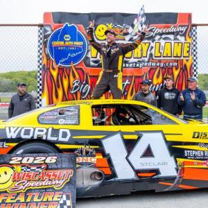 An excited Josh St. Clair climbs out of his car after winning the 2026 Coastal 200. Jasen Dickey Photography
