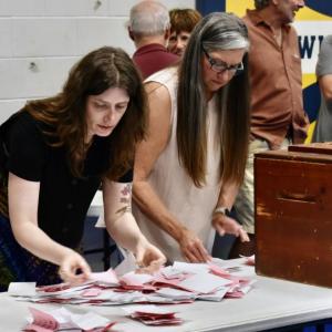 Ballot Clerk Tegan Rand (l) and Kim Dalton town administrator/town clerk sort the ballots. PHIL DI VECE/Wiscasset Newspaper