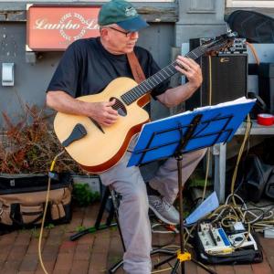  Jazz guitarist Neil Lamb, of LamboLaw Jazz Duet, playing at a previous sidewalk concert during a past Wiscasset Art Walk. Bob Bond photo