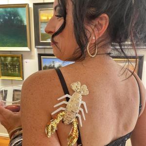 Award-winning plein air artist, Crista Pisano, displays her lobster ware in Sylvan Gallery during the August 2025 Wiscasset Art Walk. Lucia Droby photo