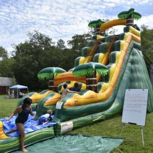 The waterslide is one popular attraction on Children's Day at Boothbay Railway Village Museum. File photo
