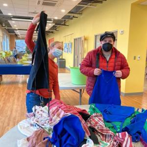 Robin Lord and Michael Turner volunteer at the FARMS Kitchen at the CLC YMCA. Photo courtesy of DSP support staff