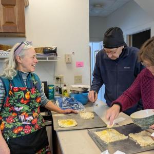 Participants make traditional galettes des rois (King cakes) for Epiphany 2026. Courtesy photo