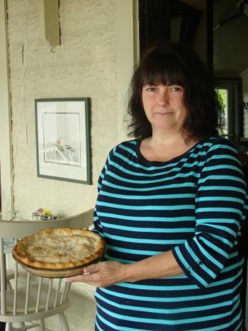 Daphne Cromwell of D-zerts by Daphne holds a pie she made for the Wiscasset restaurant Le Garage. SUSAN JOHNS/Wiscasset Newspaper